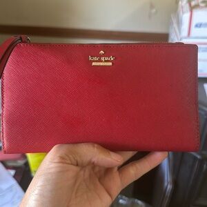 Kate Spade wallet 2 callouts possible ink front and back one small tear corner